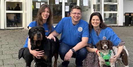 Maciej Parys with colleagues and dogs, outside the Hospital for Small Animals on Easter Bush Campus
